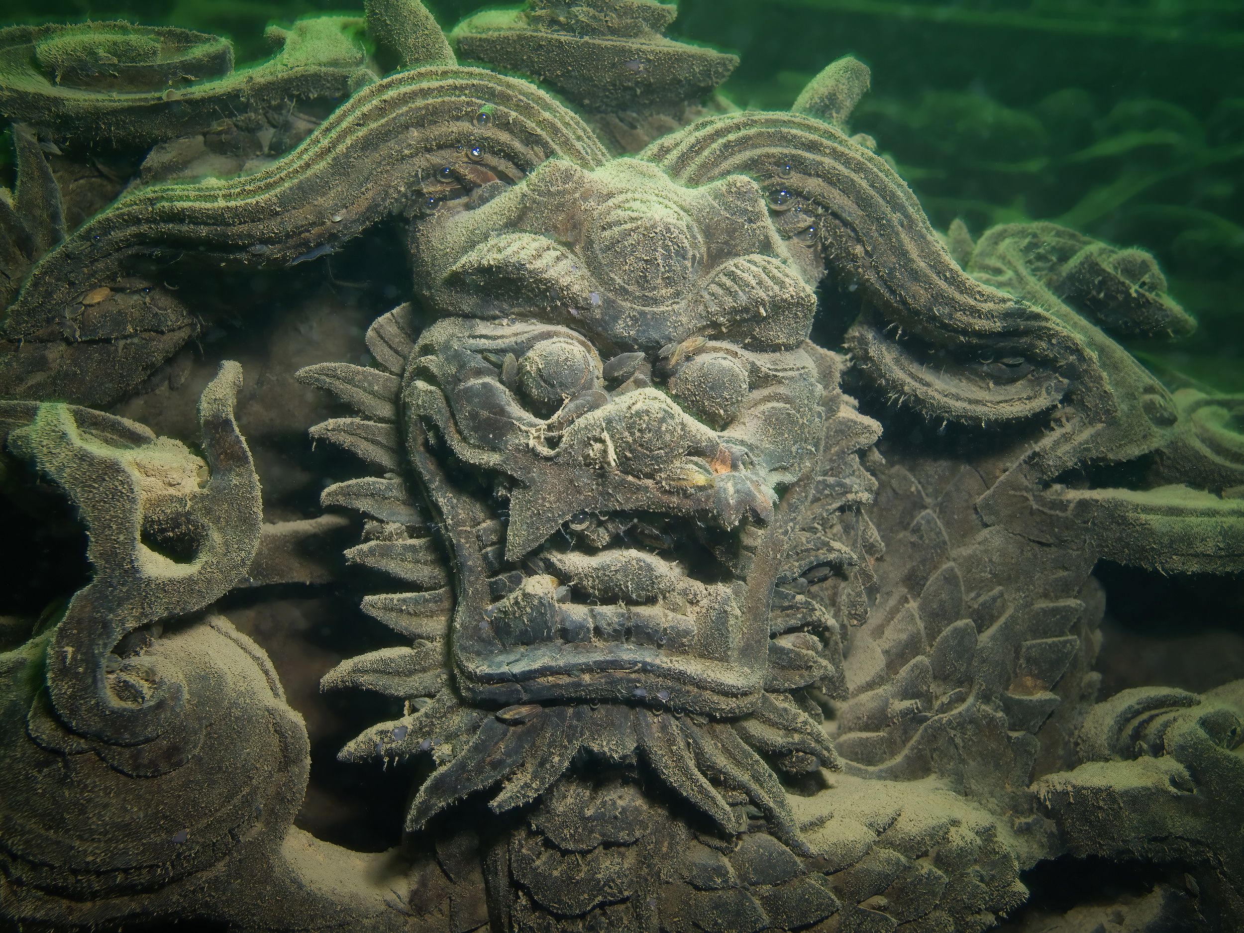 Carving on submerged building, Qian Dao Lake, China. Photo by Don Silcock