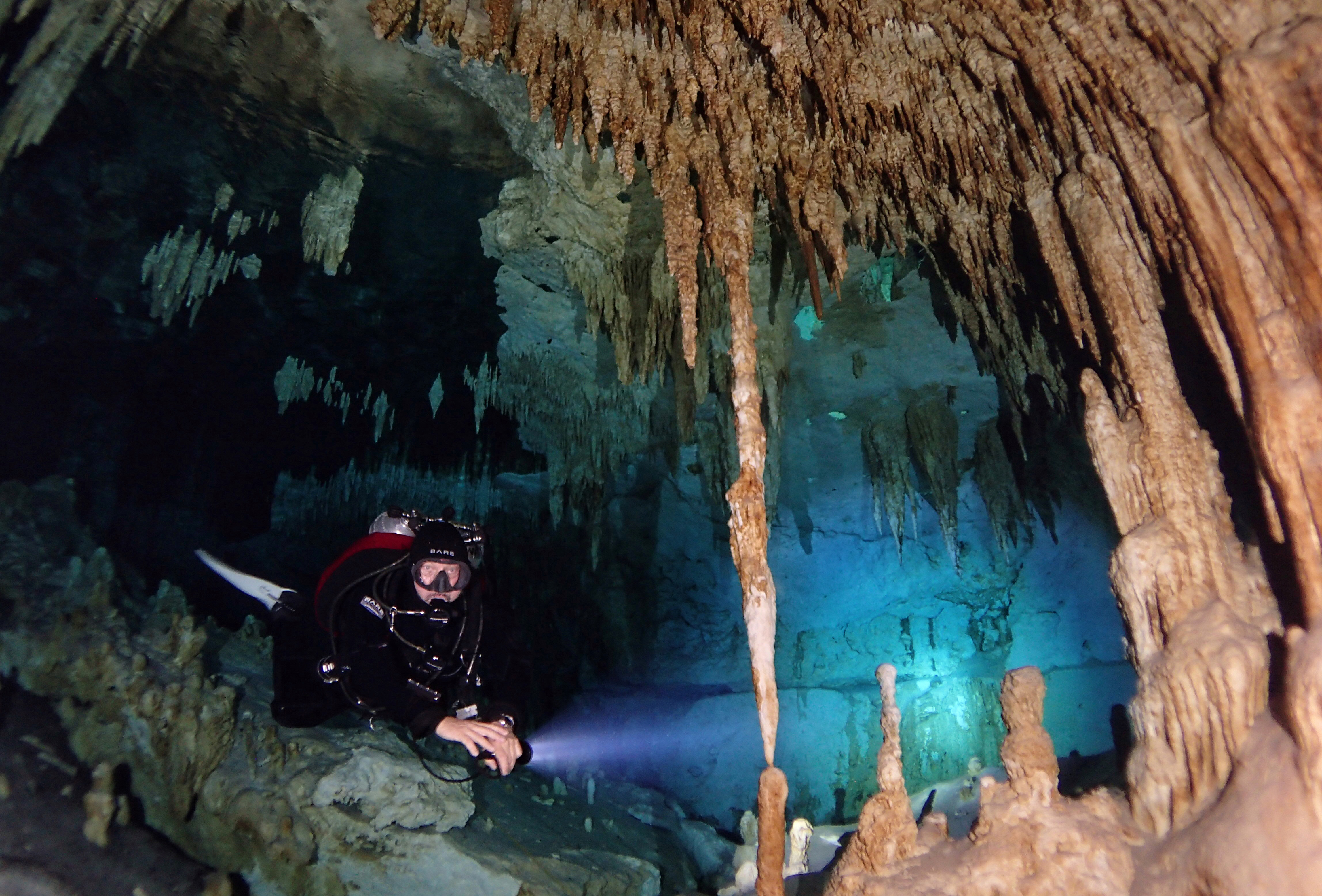 Cave diver in Cenote Taak Bi Ha, Tulum, Mexico. Photo by Ivone Bender