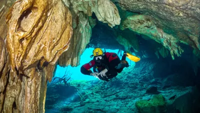 Cave diver with rebreather