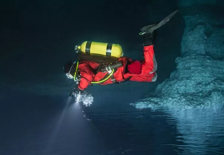 Cave diver in drysuit. Photo by Andrey Bizyukin
